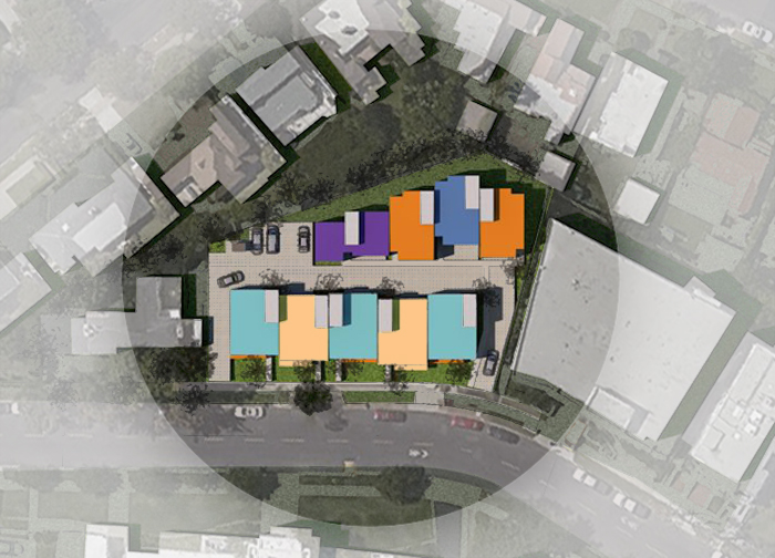 Overhead image of nine modern units, each with a colored roof to denote their unit type. They sit within a colored circle, and the other buildings outside the circle have an opaque filter over them.