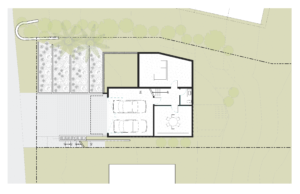 Ground floor site plan of a modern house. Shows the garage and entryway.