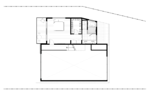 Third story plan of a modern house. Includes an outdoor patio, bathroom, closet, and bedroom, with a space left open to the floor below.