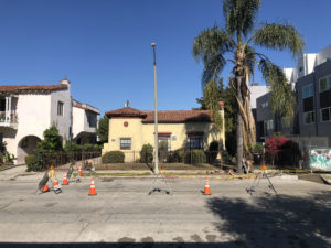 View of an existing vacant triplex and a vacant single unit from the street.